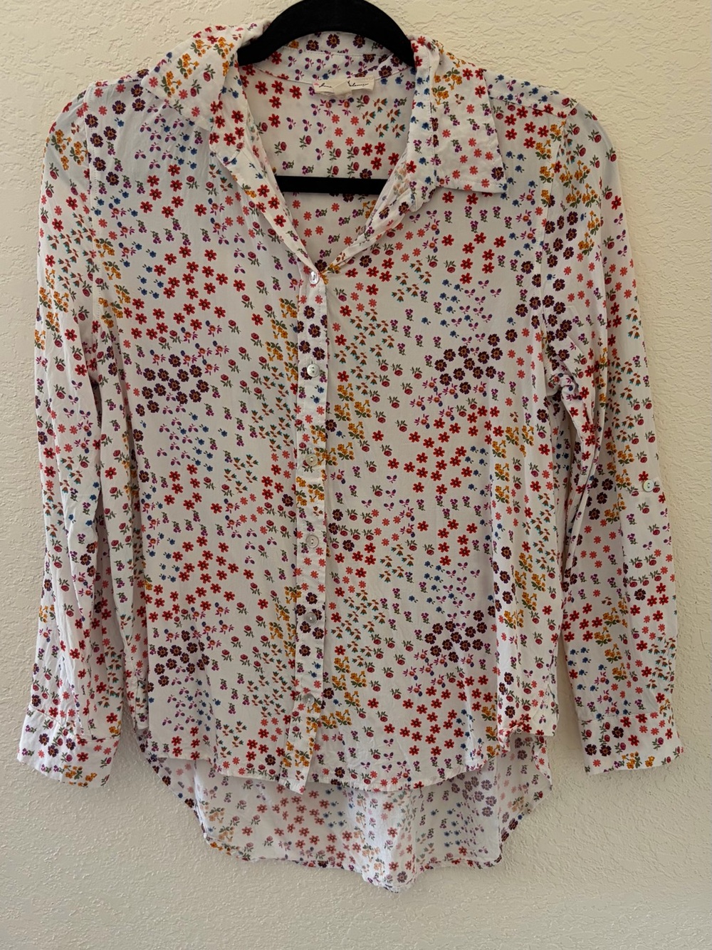 White button up with multi colored floral print Size M